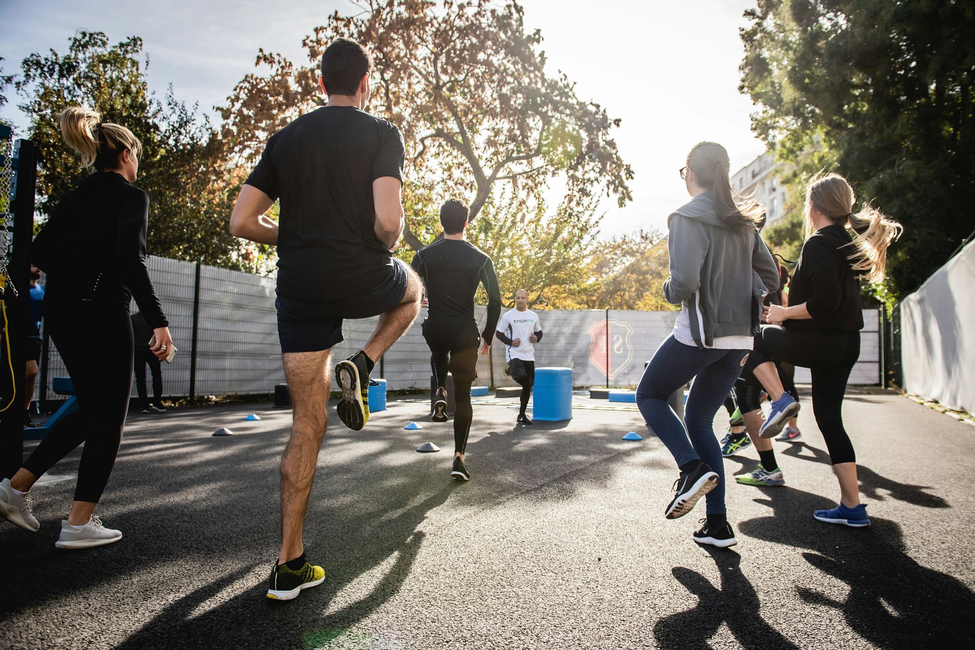 A groupof people outdoors doing sport together