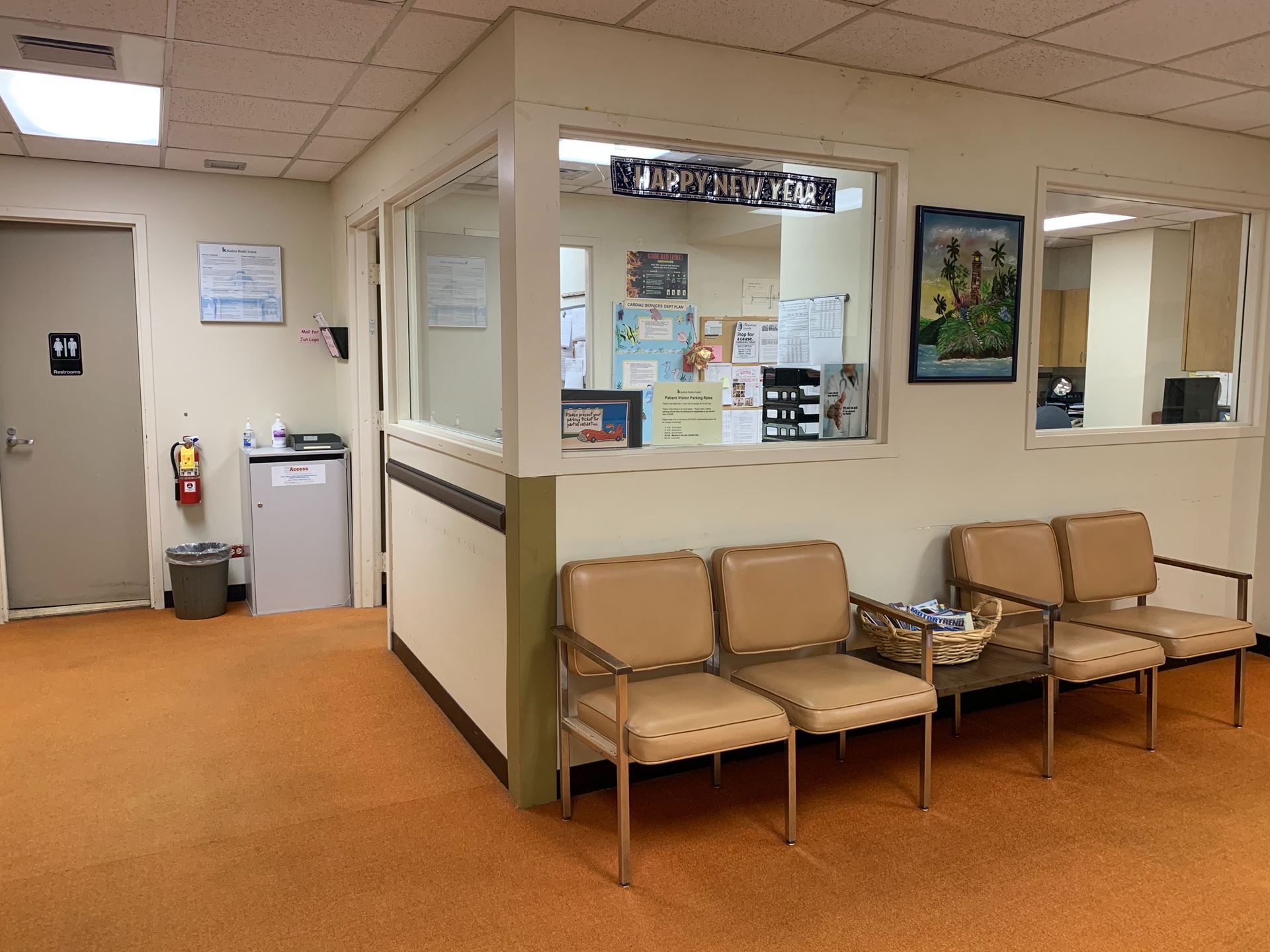 An image of a hospital waiting room, with empty chairs